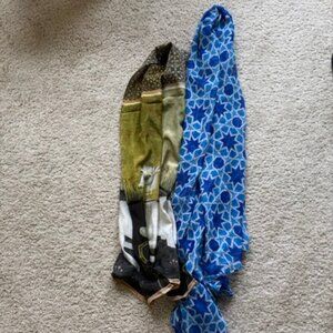 Lot of 2 scarves: gold and brown medieval tapestry; and blue geometric pattern